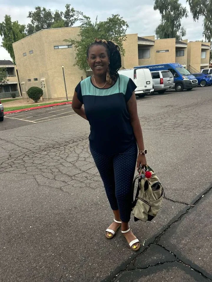Patient smiling outdoors eight weeks after surgery